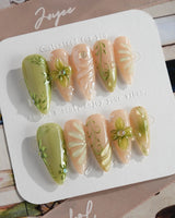 Vines - Sneaky Climber press-on nails in medium stiletto shape — Fresh Avocado Green, Hand-painted Vines & 3D Flowers.