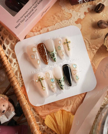 Vintage V handmade press-on nails featuring Vintage Oil Painting Style, 3D Cross & Gemstones.
