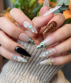 Vintage V nail set with vintage painted details, raised cross accents, and gemstone decor