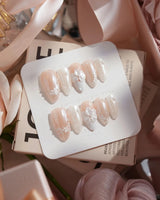 White Musk nail art close-up showing Ethereal Aurora White, 3D Flowers & Delicate Glitter effect details