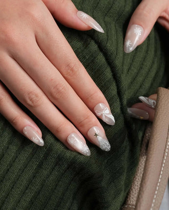 Snowfall press-on nails — pearl nude cat eye snowflake bow silver glitter soft sheen handmade nail art by Joyee Nails