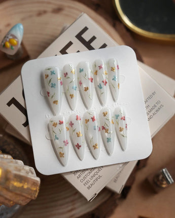 Wildflower press-on nails in long stiletto shape — Fresh Creamy White, Colorful Metallic Dainty Florals & Gold Wire Stems.