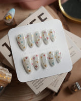Wildflower press-on nails in short almond shape — Fresh Creamy White, Colorful Metallic Dainty Florals & Gold Wire Stems.