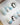Winter penguin press-on nails with snowman and snowflake details