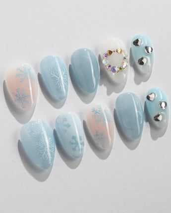Winter wonderland press-on nails — Icy Blue Snowflakes, Rhinestone Wreath & Hearts. handmade nail art by Joyee Nails