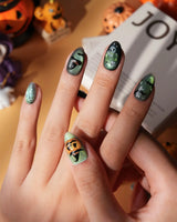 Witch's Cat press on nails with a black cat on a jack-o-lantern, witch hat, skulls, bats and a spider web on green shimmer cat eye - image 5