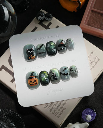 Witch's Cat handmade press-on nails in extra short squoval shape by Joyee Nails