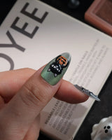 Witch's Cat handmade press-on nails in medium almond shape by Joyee Nails