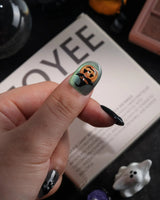Witch's Cat handmade press-on nails in short oval shape by Joyee Nails
