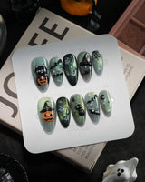 Witch's Cat handmade press-on nails in medium almond shape by Joyee Nails