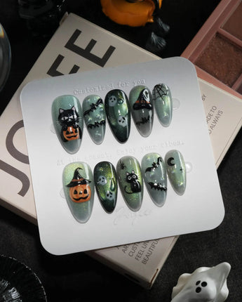 Witch's Cat handmade press-on nails in medium almond shape by Joyee Nails