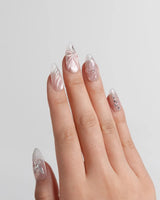 Wonderland nail art close-up showing Ethereal Pearl Pink Cat-eye, 3D Bows & Water Ripple Textures. details