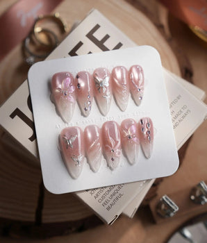 Wonderland press-on nails — Ethereal Pearl Pink Cat-eye, 3D Bows & Water Ripple Textures. handmade nail art by Joyee Nails