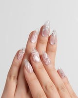 Wonderland handmade press-on nails featuring Ethereal Pearl Pink Cat-eye, 3D Bows & Water Ripple Textures.