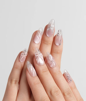 Wonderland handmade press-on nails featuring Ethereal Pearl Pink Cat-eye, 3D Bows & Water Ripple Textures.