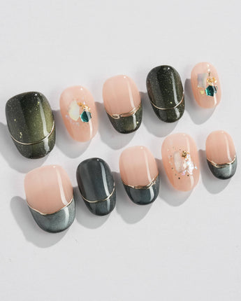 Woodland Sea in extra short oval shape with green cat-eye French tips and gold lines