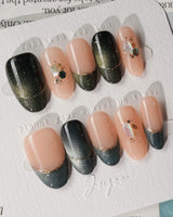 Woodland Sea in medium oval shape with dark green cat-eye effect and shell glitter accents