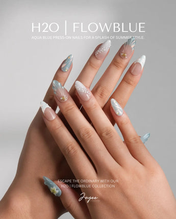 Yasawa Blue custom-size nails with jelly blue shell swirls and pearl beach details
