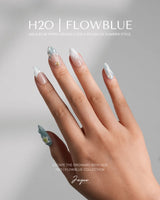 Yasawa Blue medium almond press-ons with ocean swirls, pearls, and tropical starfish